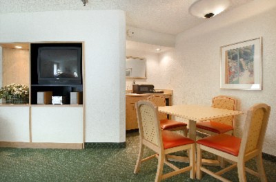Eating Area And T.v. In Suite's Living Area