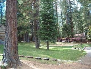 Backyard Different Angle With Volleyball Court.