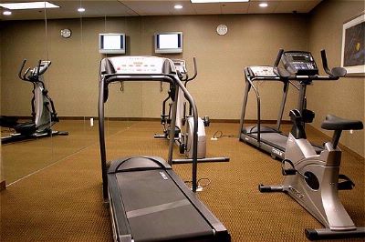 Holiday Inn Express & Suites - Fitness Center Complimentary 6am-11pm Daily