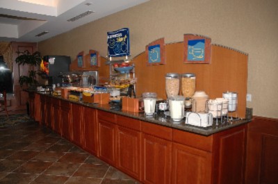 Holiday Inn Express Hotel & Suites - Full Breakfast With Omelets Sausage And Fresh Cinnamon Rolls.