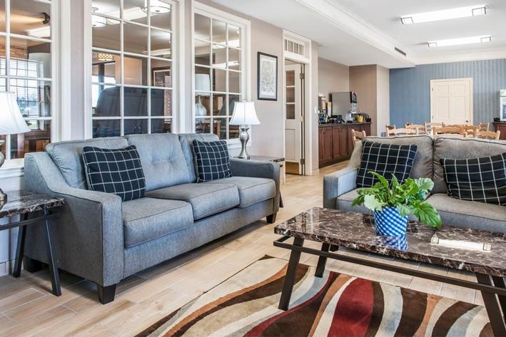 Quality Inn - Enjoy Our Hearth Room With New Tv