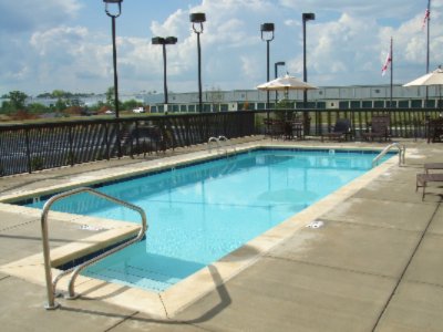 Enjoy The Southern Sun Outside At Our Comfortable Pool Area