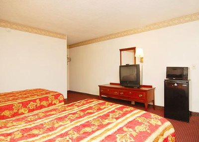 Guest Room With Microwave And Refrigerator