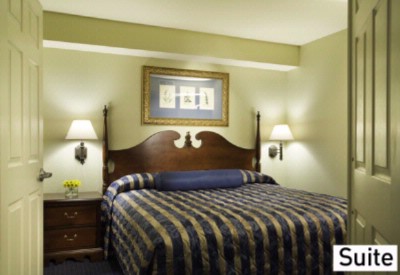 Patrick Henry Square / Inn & Suites - Suite Master Bedroom
