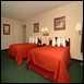Quality Inn & Suites - 2 Double Bed Suite/bedroom Area