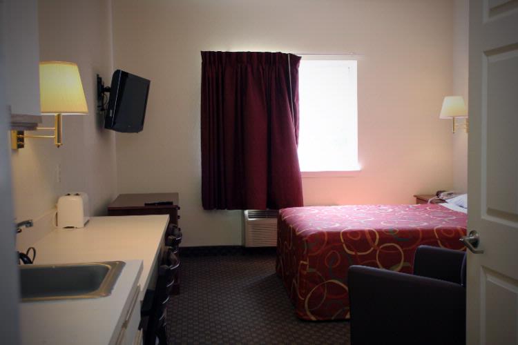 Crestwood Suites Austin - Closet Space Available With Iron And Board