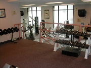 Fitness Room With 7 Cardio Machines And Free Weights