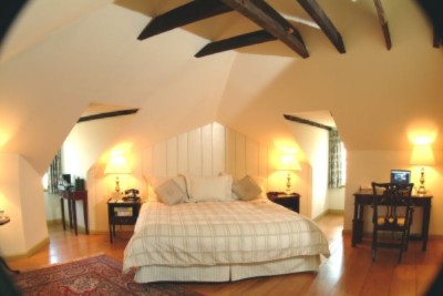 Admiral Fell Guest Room Vaulted Ceiling