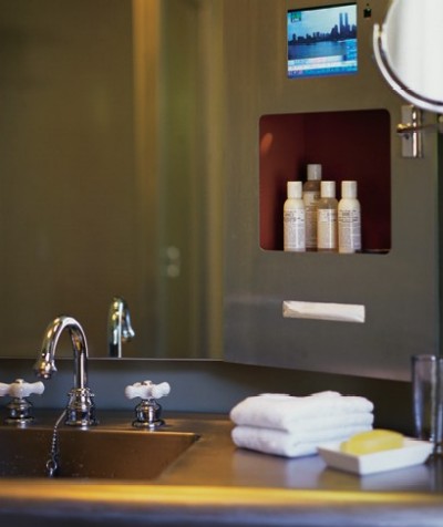 Tribeca Grand Hotel - Futuristic stainless steel vanity / TV