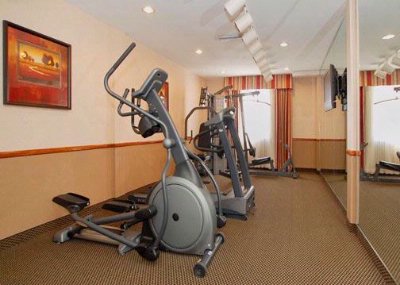 Comfort Suites - Fitness Room With Treadmill Eliptical And Multi Station Weight System