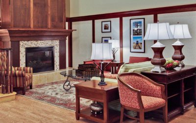 Country Inn & Suites - Hotel Lobby & Fireplace