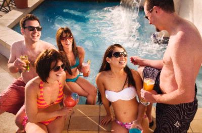 Hilton Costa Mesa - Gather Friends And Enjoy Drinks Poolside