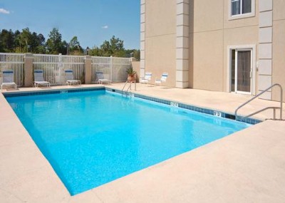 Quality Inn & Suites - Soak Up The Sun At Our Seasonal Outdoor Pool