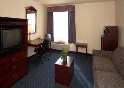 Quality Inn & Suites - Select Suites Offer Separate Seating Areas And Pullout Sofas