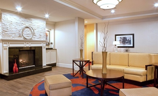 Homewood Suites by Hilton Cambridge / Arlington - Lobby Features Inviting Fireplace And Overstuffed Chairs