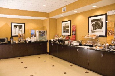 Hampton Inn & Suites - Our Complimentary Breakfast Includes Assorted Cereals Toast Fresh Fruit Yogurt And Scrambled Eggs.