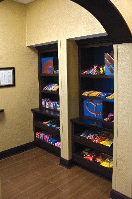 Hampton Inn & Suites - The Suite Shop Also Carries Your Favorite Candy Bar Chips Cookies Or Toiletry Items.