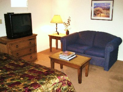 The Santa Fe Suites - Queen Bed & Couch View