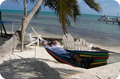 Belize Odyssey Resort - Relaxing In Hammock On Beach