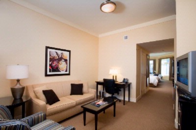 West Inn & Suites - Living Area In Suites