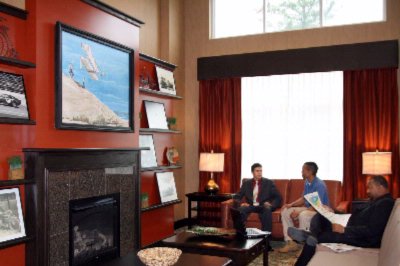 Hampton Inn & Suites Charlotte Airport - Fireplace And Lounge