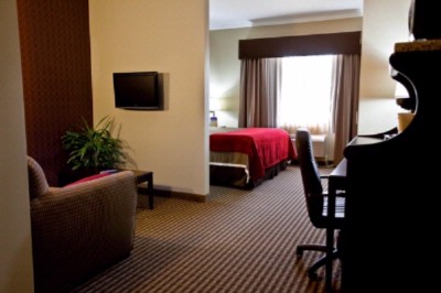 Best Western Olathe Hotel & Suites - King Suites Have A Separate Seating Area With An Additional Tv-dvd Combo!