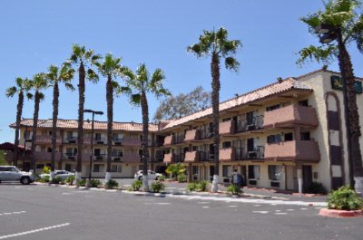 Quality Inn San Diego - Southwestern Exterior With Palm Trees