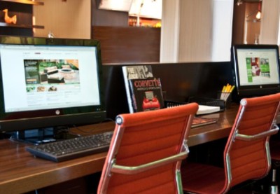 Courtyard by Marriott - Cafe Area With Flat Screen Hi-def Tv