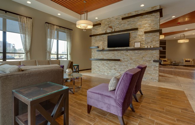 Drury Inn & Suites Overland Park - Not Only Can You Sleep Here You Can Heat Up Your Left-overs Watch Two Tvs And Have Enough Space For Your Ab Workout.