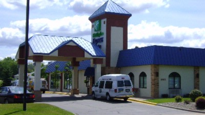 Front Of Hotel - Day