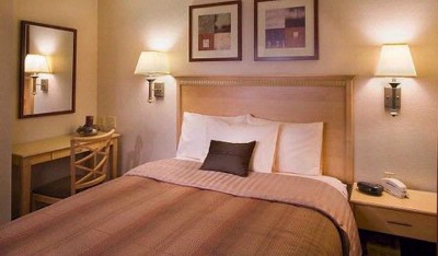 Candlewood Inn & Suites - Suite Bedroom