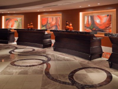 New Orleans Marriott - The Front Desk Offers Efficient Check-in With Pod Style Desks And Self-check In Kiosks.