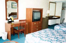 Two Double Beds With Work Desk