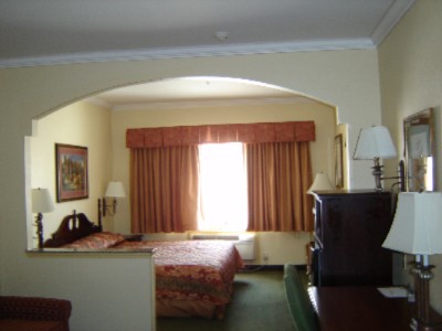 Best Western Sam Houston Inn & Suites - King Suite Sleeping Area
