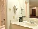 Super 8 - Guest Bathroom Equipped With Coffeemaker Hairdryer