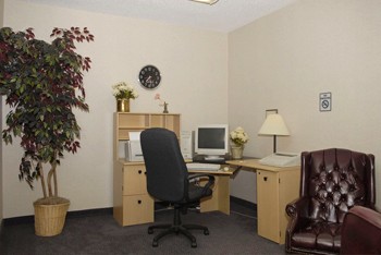 Business Center With Complimentary Computer Use And Discussion Area.