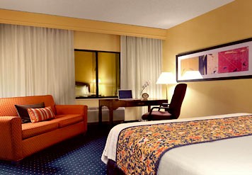 Tempe Downtown Courtyard by Marriott - Our King Guest Rooms Feature The Comfort Of Marriott Luxury Bedding In-room Coffee And Tea Iron Ironing Board Hairdryer And Loveseat.
