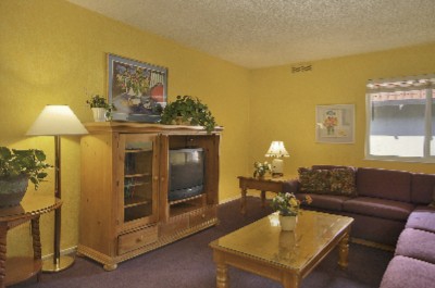 Ramada University - Livingroom Of Suite