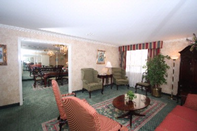 Radisson Hotel Research Triangle Park - The Sitting Area Of The 102 Suite Complements The Boardroom Area