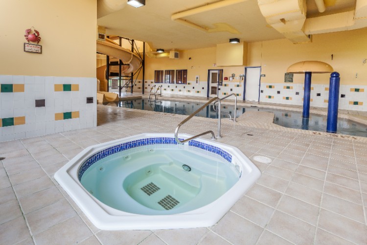 Pool Area Slide And Hot Tub