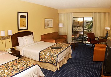 Traveling Together? We Offer Spacious Guest Rooms With Two Queen-sized Beds More Than Enough Room For Two Featuring The Comfort Of Marriott Luxury Bedding A Loveseat In-room Coffee And Tea An Iron Ironing Board Hairdryer And So Much More.
