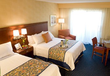 Scottsdale Courtyard by Marriott at Mayo Clinic - Our Guest Rooms Features The Comfort Of Marriott Luxury Bedding In-room Coffee And Tea Iron Ironing Board Hairdryer And Loveseat.