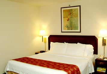 Our King Guest Room Features The Comfort Of Marriott Luxury Bedding A Loveseat In-room Coffee And Tea And So Much More.
