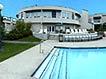 Relaxing Outdoor Pool And Patio With Barbeque Area.