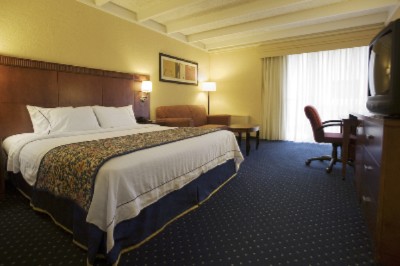 A Fully Equipped Guest Room Will Encourage You To Be Productive During Your Stay.