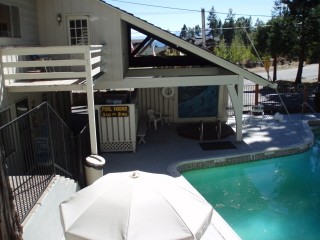 Tahoe Vistana Inn - In The Back Just To The Left You Can See Our Hot Tub Beneath The Roof Perfect For Tubbing When The Weather Isn't Perfect!