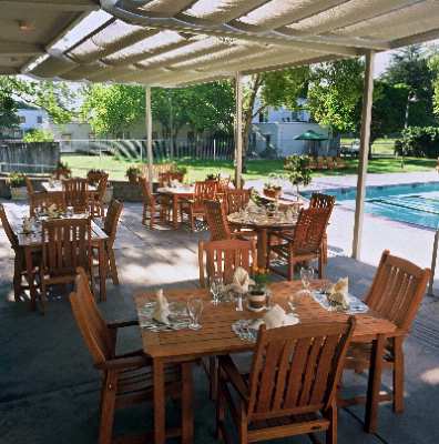 Lion's Gate Hotel - Enjoy Your Meals On Our Beautiful Restaurant Patio