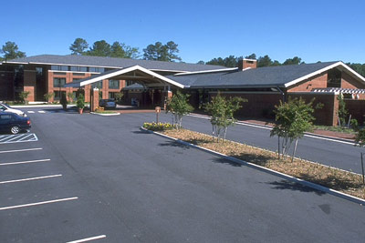 Woodlands Hotel & Suites - 